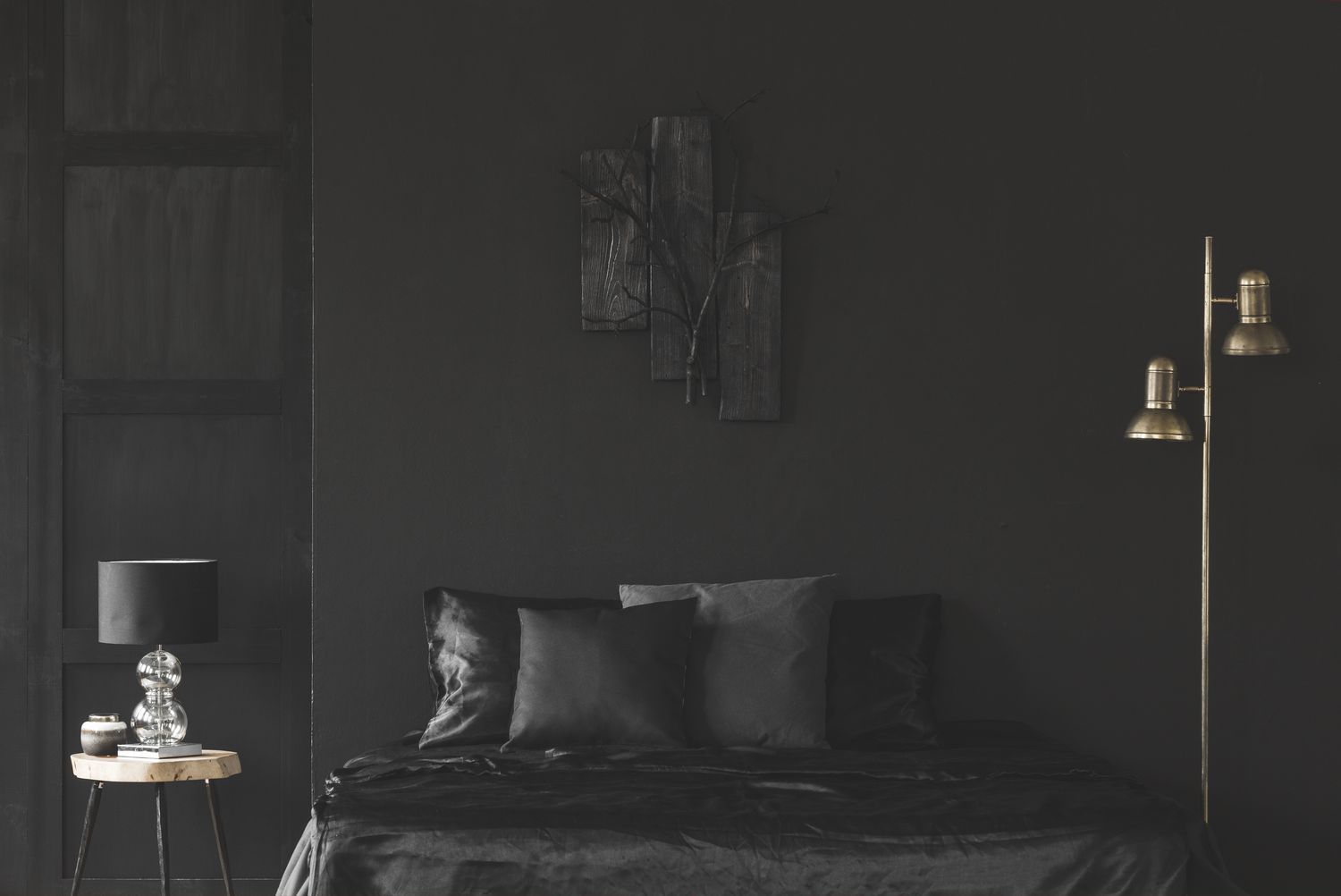 bedroom with black walls 