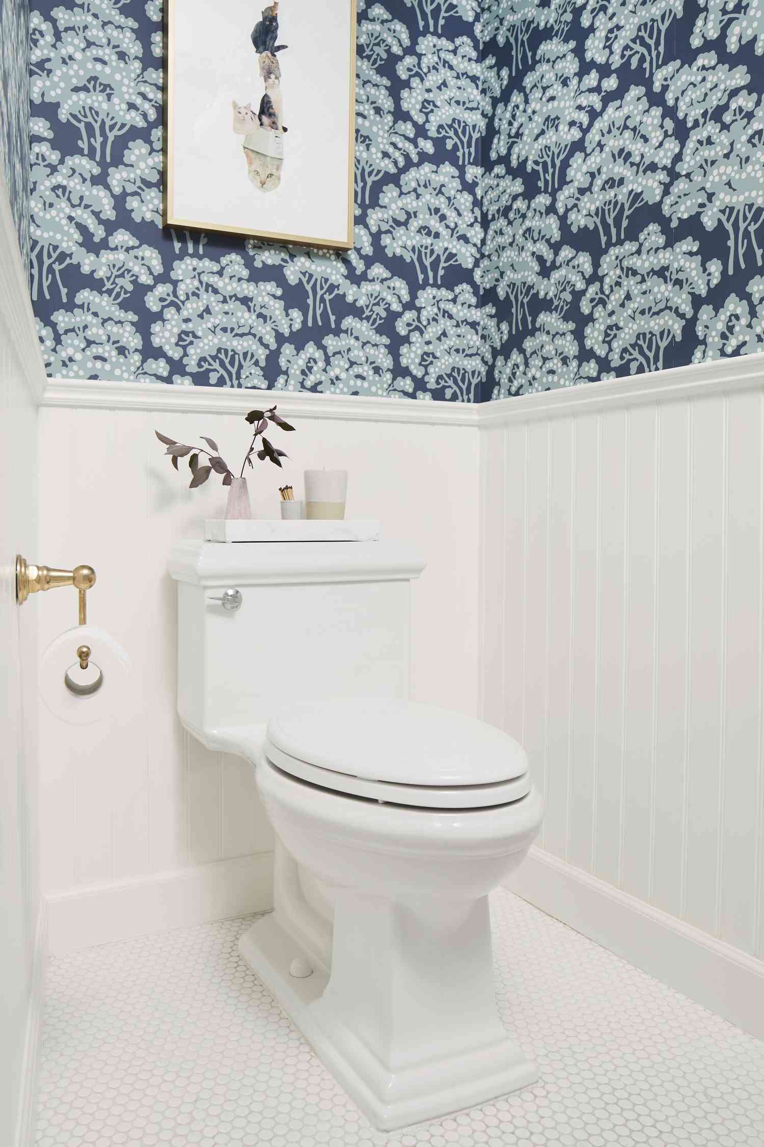 Private toilet room with wallpaper