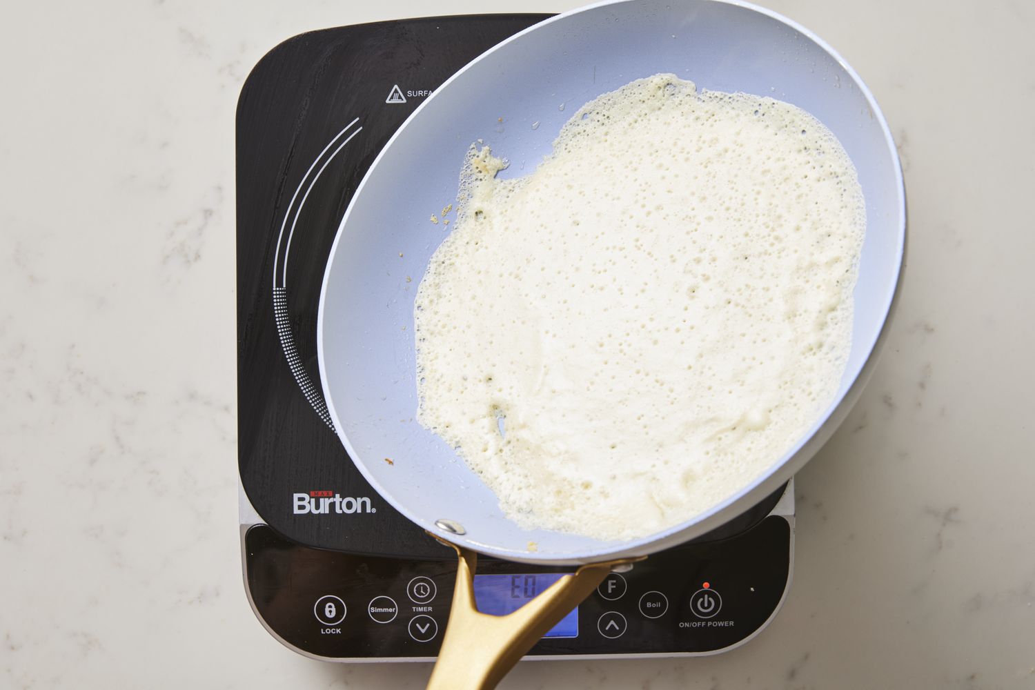 Crepe batter in skillet