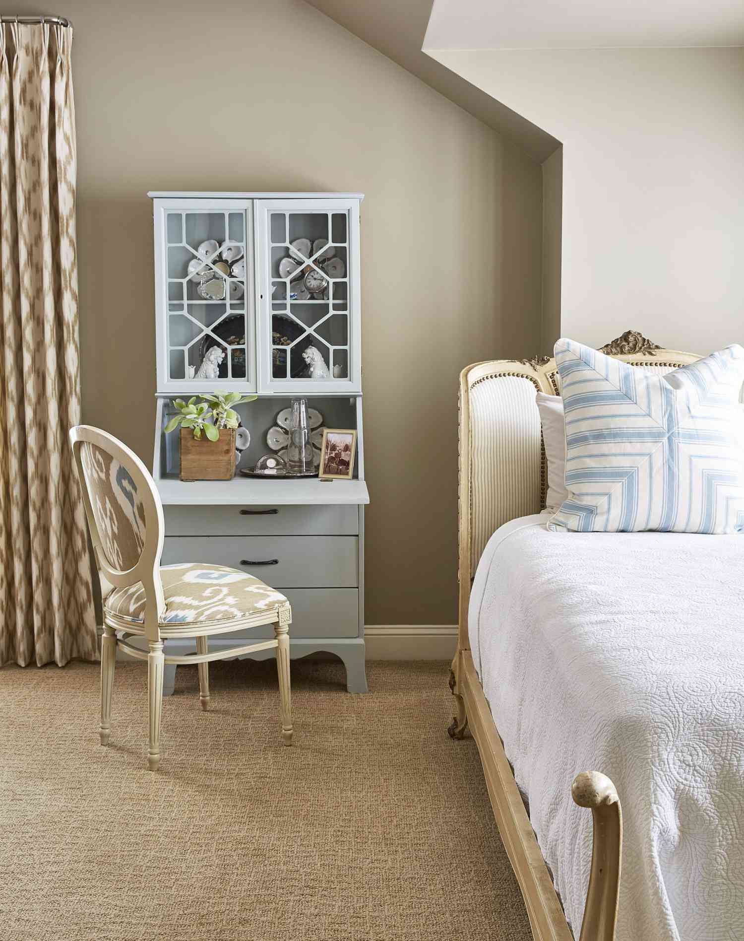 antique secretary desk in a bedroom