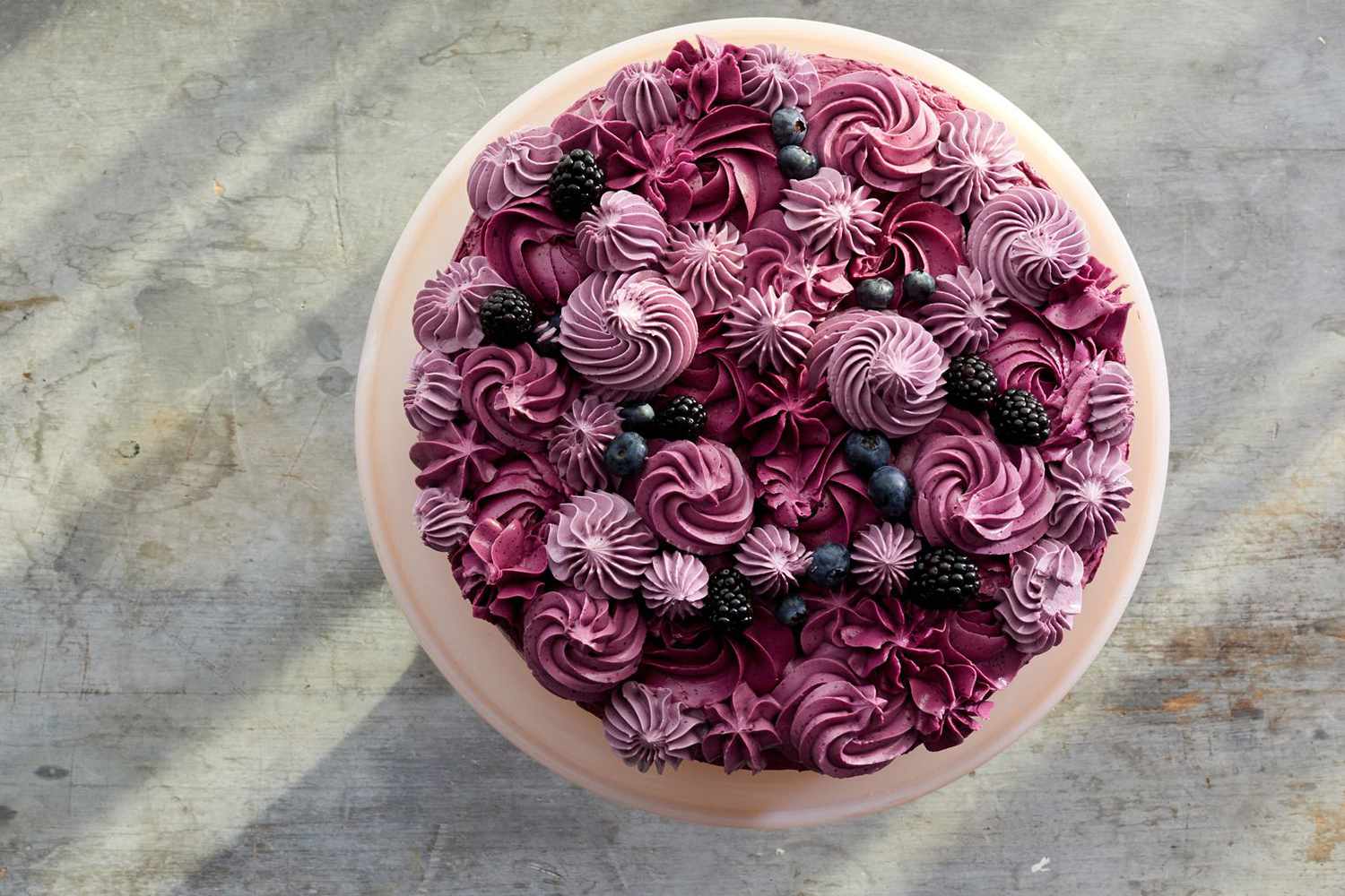 purple frosted berry layer cake