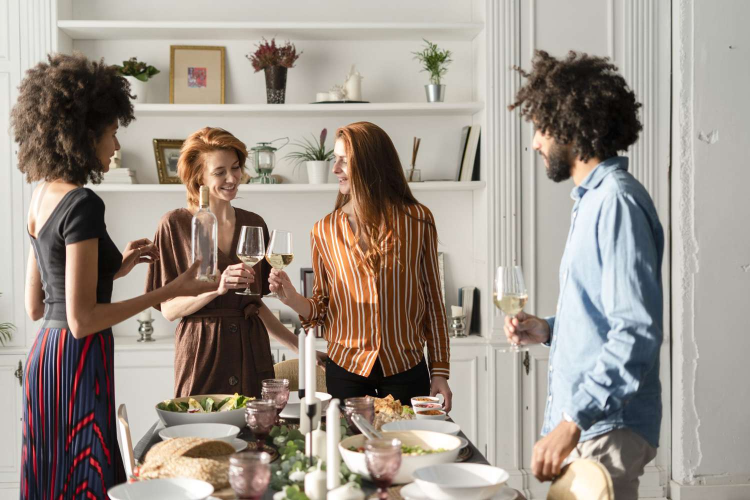 Freinds drinking wine at a dinner party