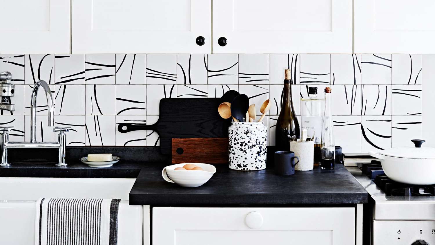 various black and white patterns themed kitchen decor and backsplash