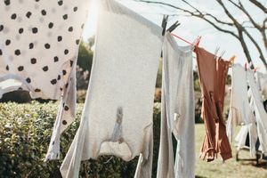 Various clothes hanging on a laundry line outdoors
