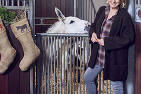 martha in stables with donkey