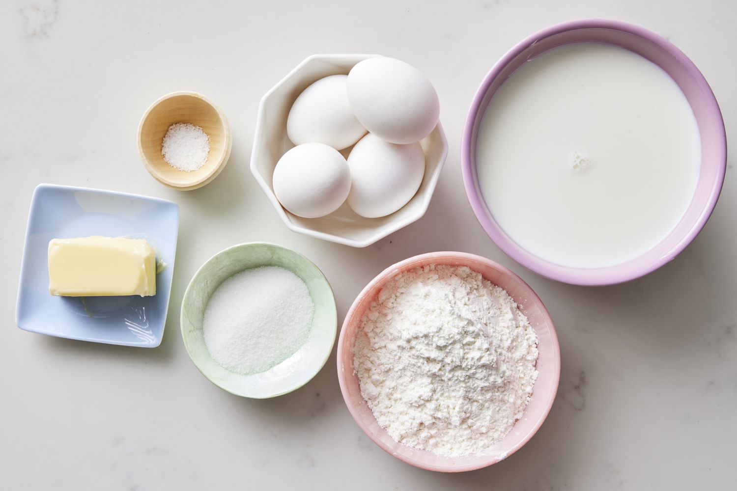 Ingredients for gluten free crepes, butter, eggs, flower, salt