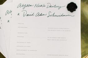 wedding programs on gold tray