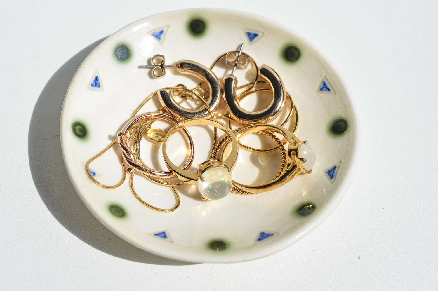Small white jewelry dish. 