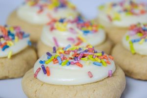Frosted cookies topped with colorful sprinkles