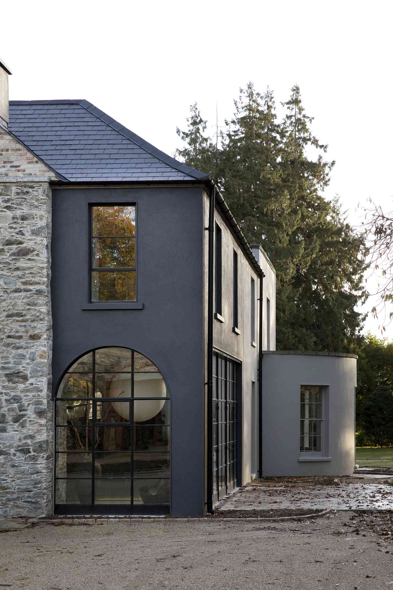 home with dark exterior paint color and modern architecture