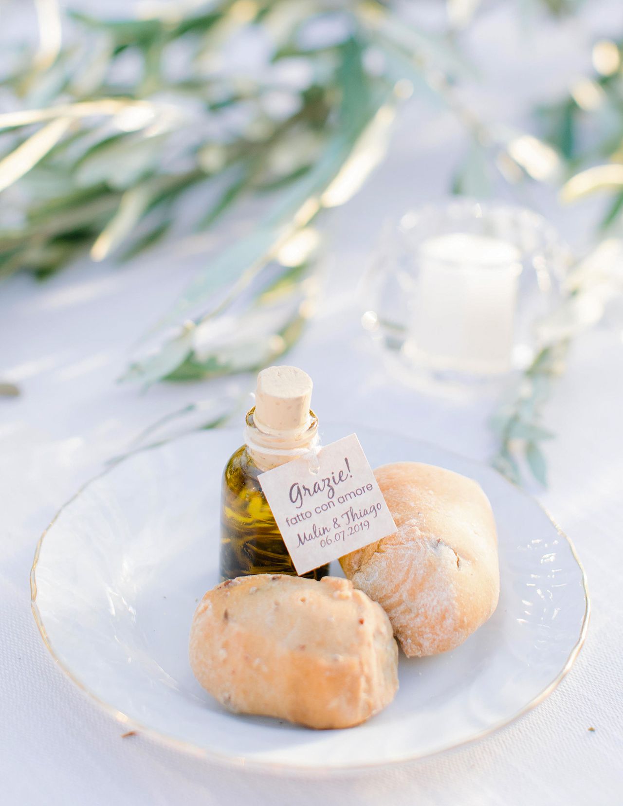 olive oil bottle wedding favor plate of pasteries