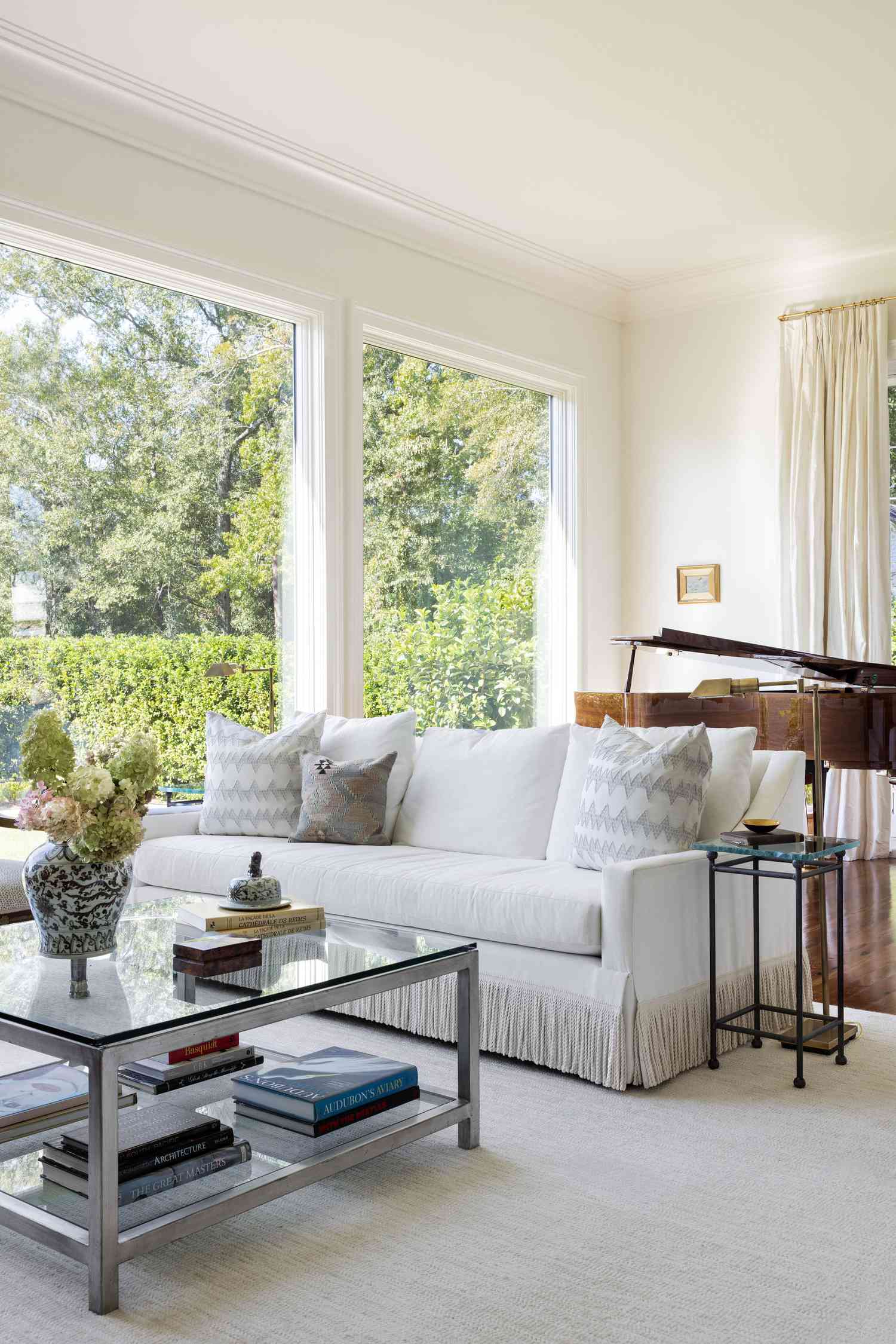 white walls with wood grand piano