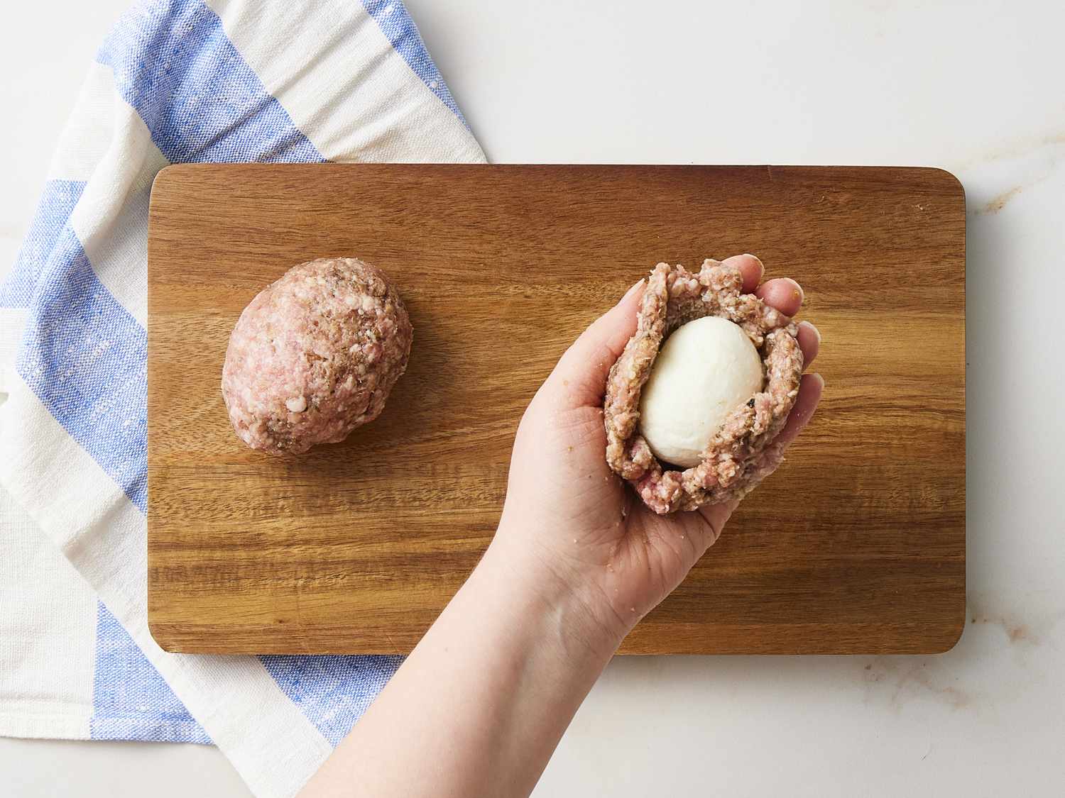 Boiled egg inside pork