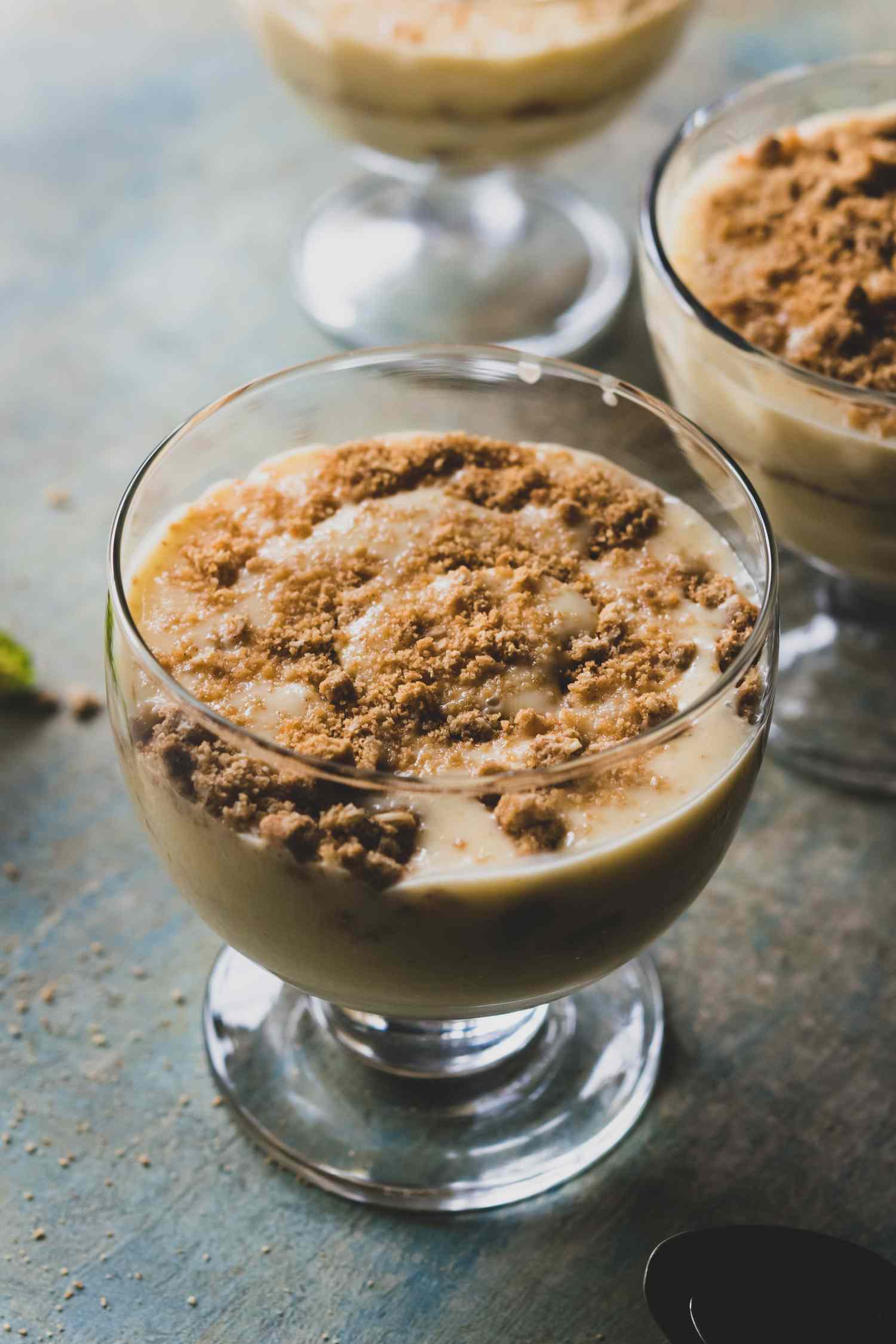 cookie crumbs on pudding in a glass