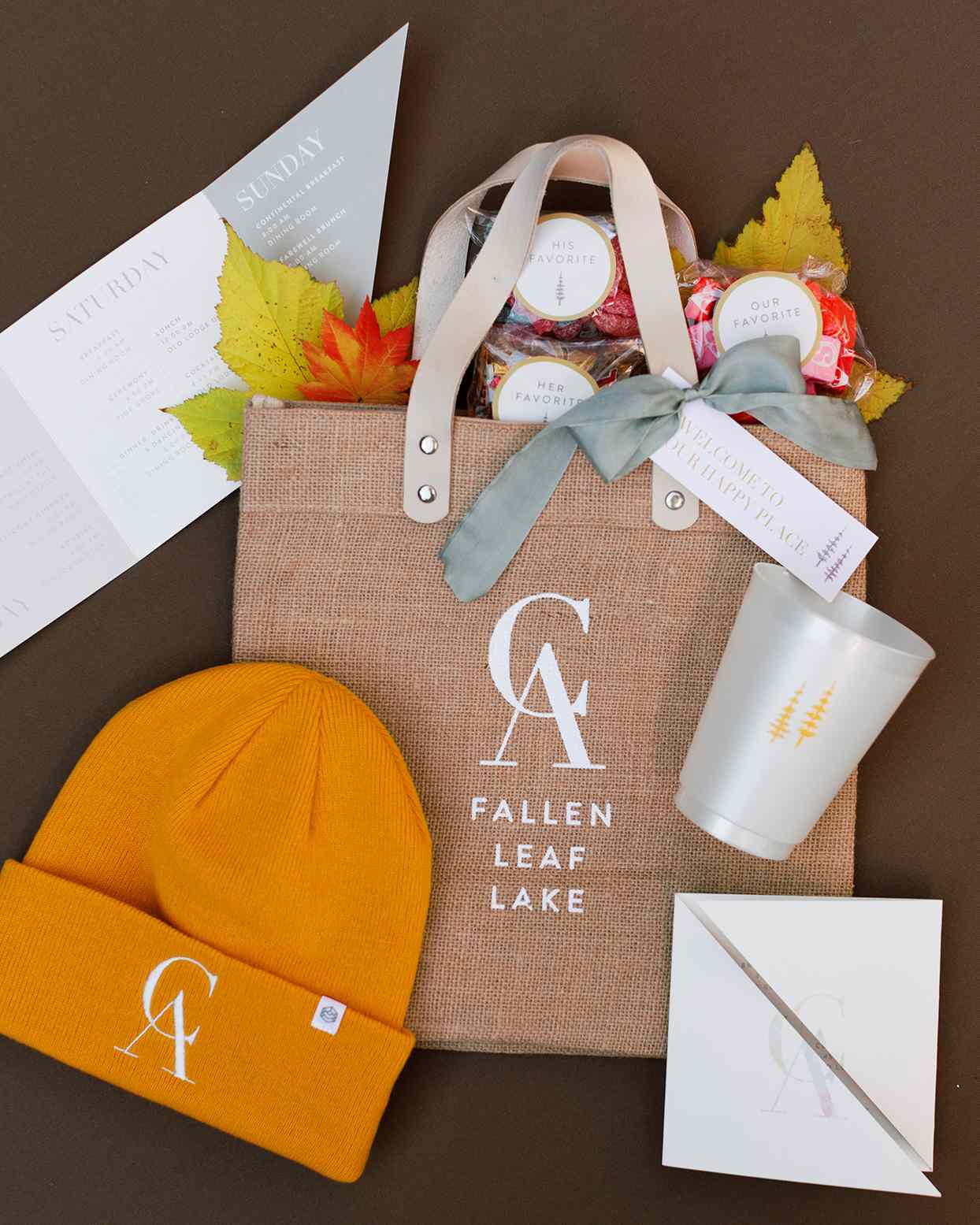 rustic welcome bags with candy, hat, cup and fall decor