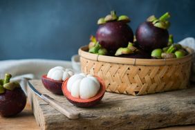 close up of cut open mangosteens fruit