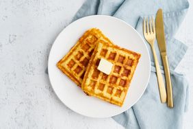 Homemade keto waffles with egg, butter and mozzarella cheese. 