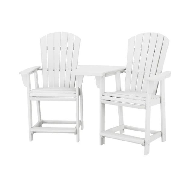 Two Adirondack chairs with a connecting table