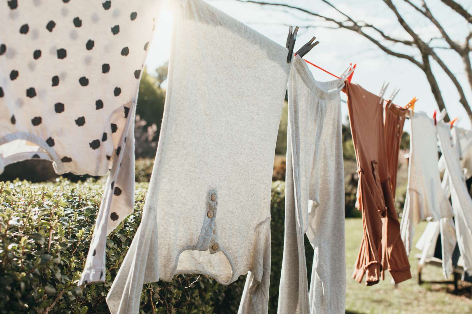 Various clothes hanging on a laundry line outdoors