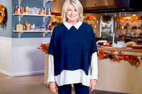 decorvow posed on set with kitchen in background