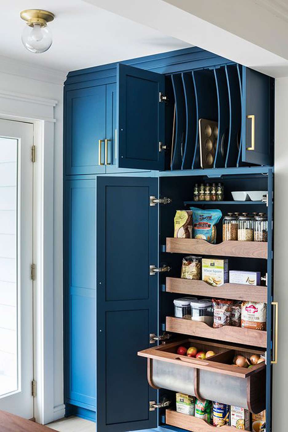 pantry organization with pull out fruit drawers