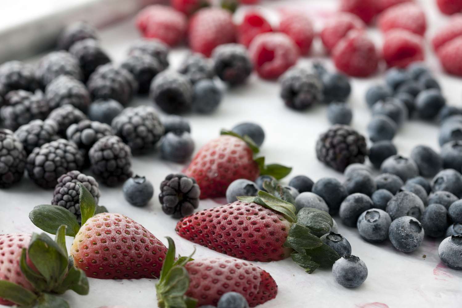 Assortment of frozen strawberries, blackberries, and blueberries