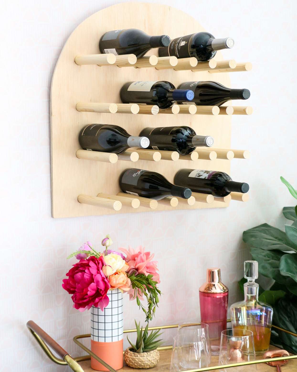 wine rack hanging above bar cart