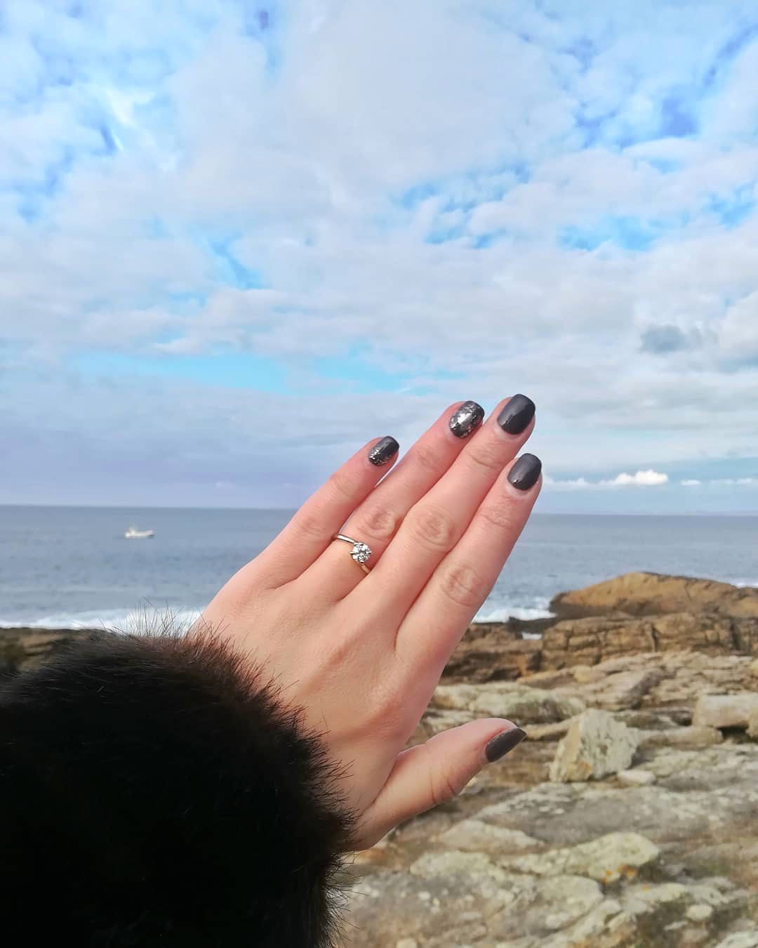 engagement ring selfie rocky ocean view