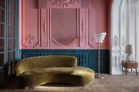 a curved sofa in a room