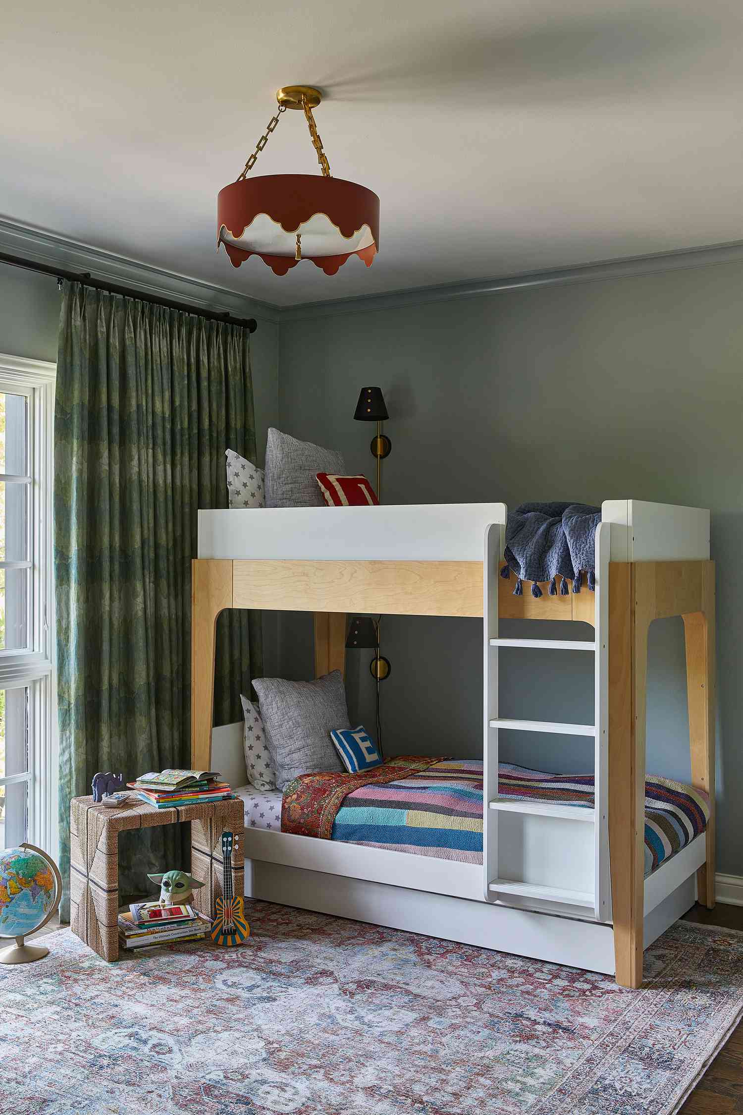 a blue kids room with bunk beds 
