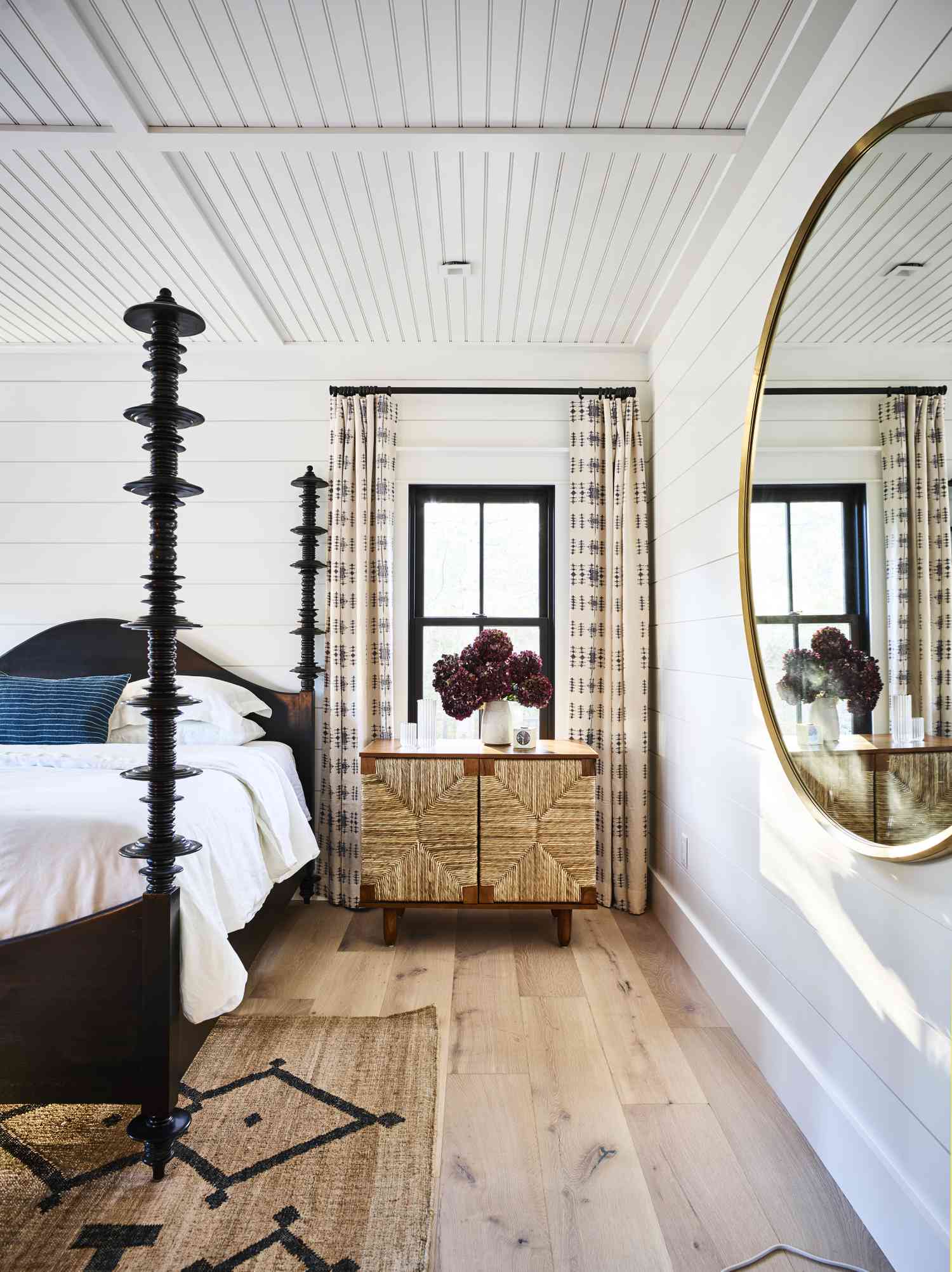 pretty bedroom with wood flooring