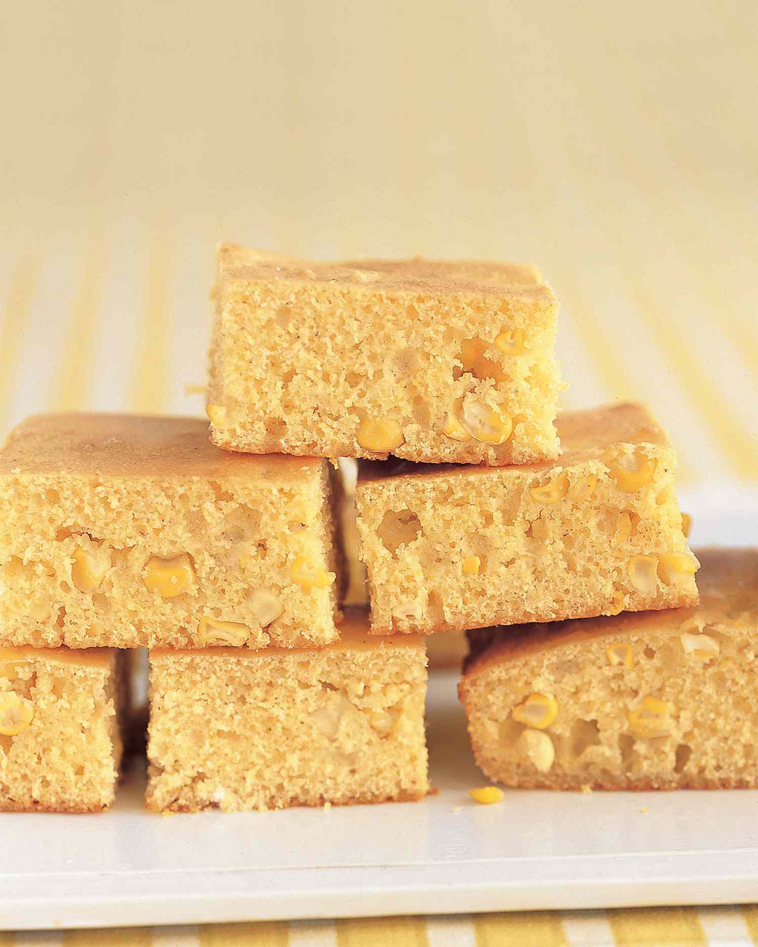 stacked pieces on corn bread on plate