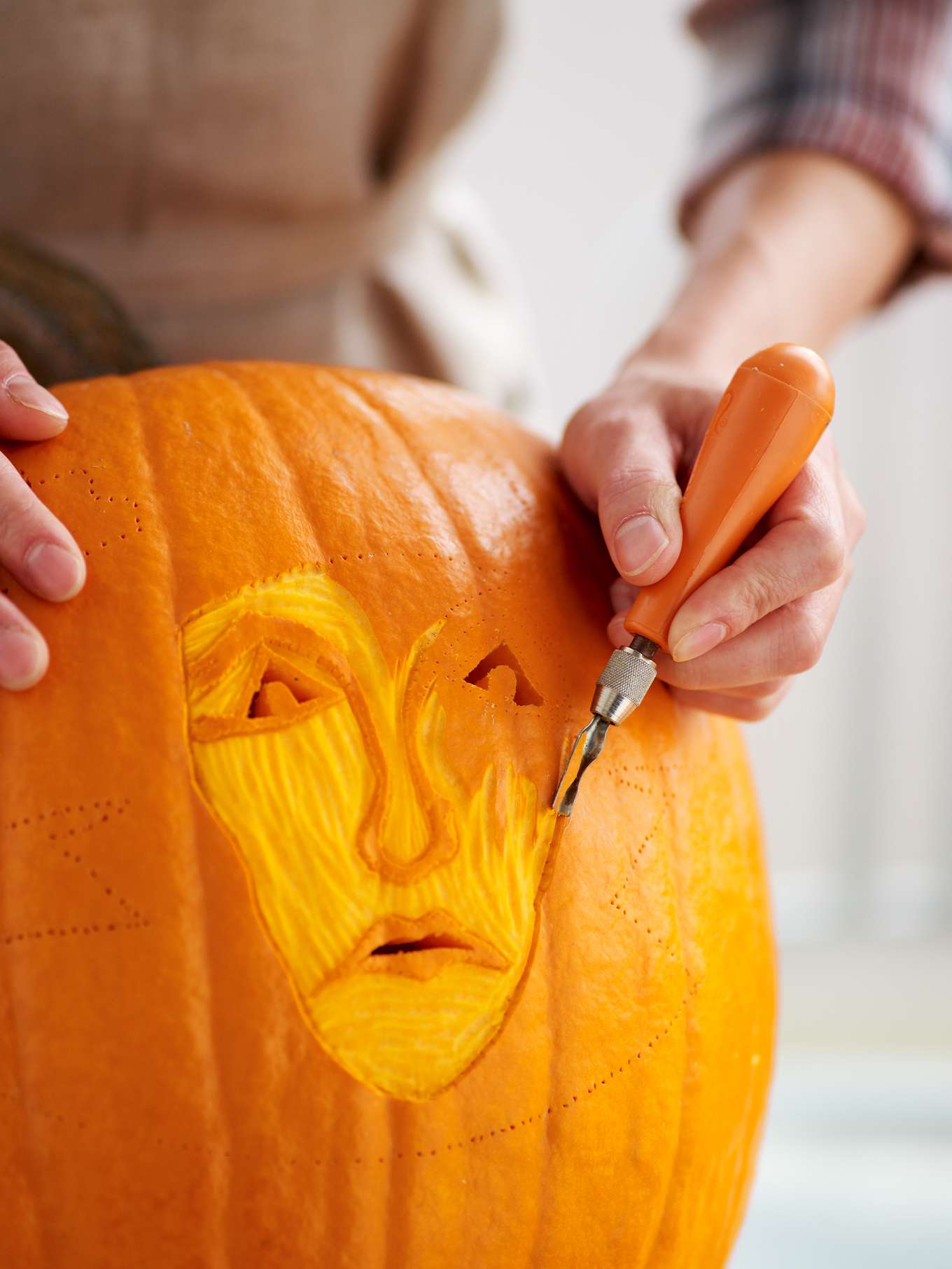 carving a pumpkin