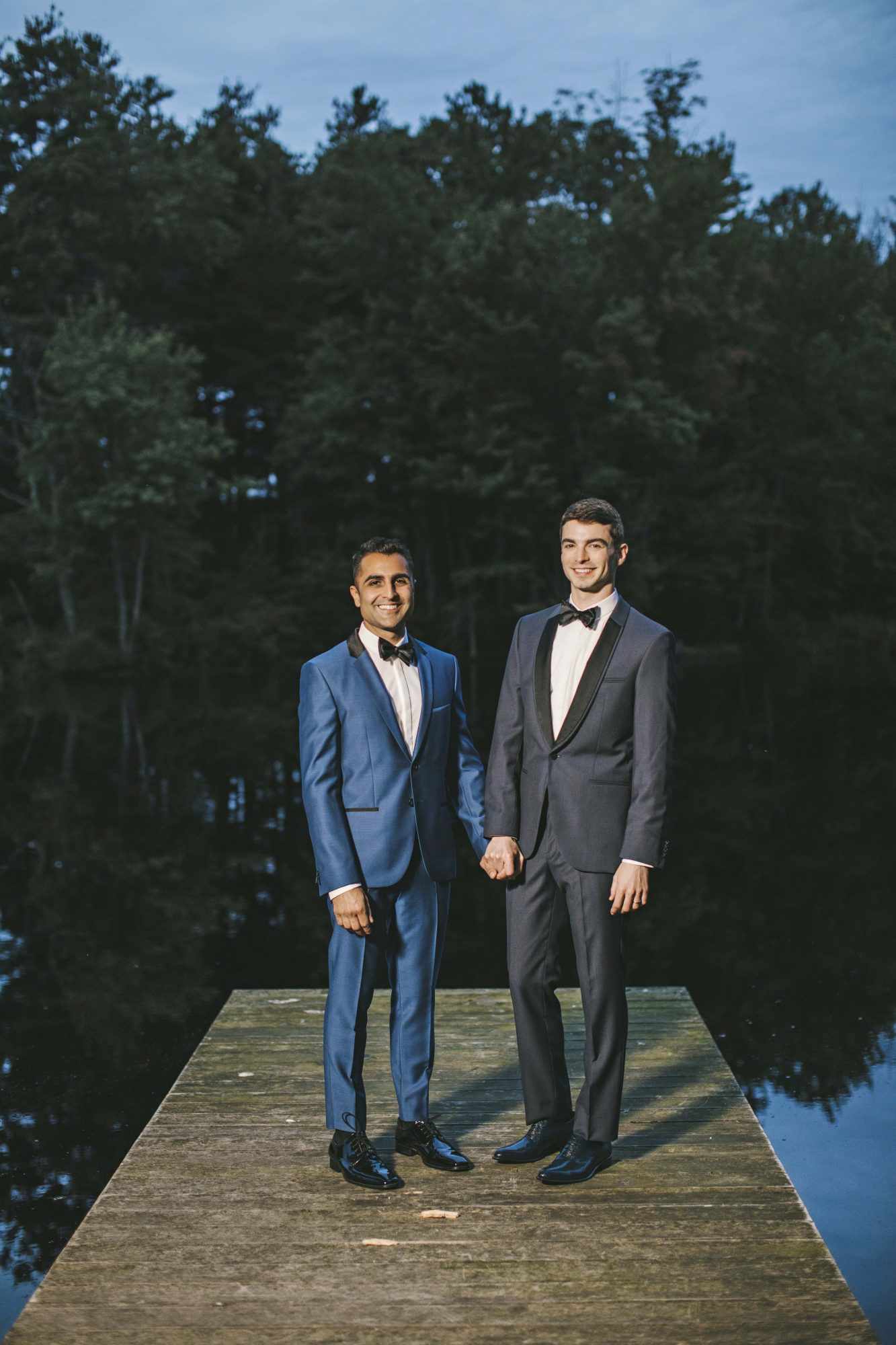 sanjay steven wedding grooms holding hands