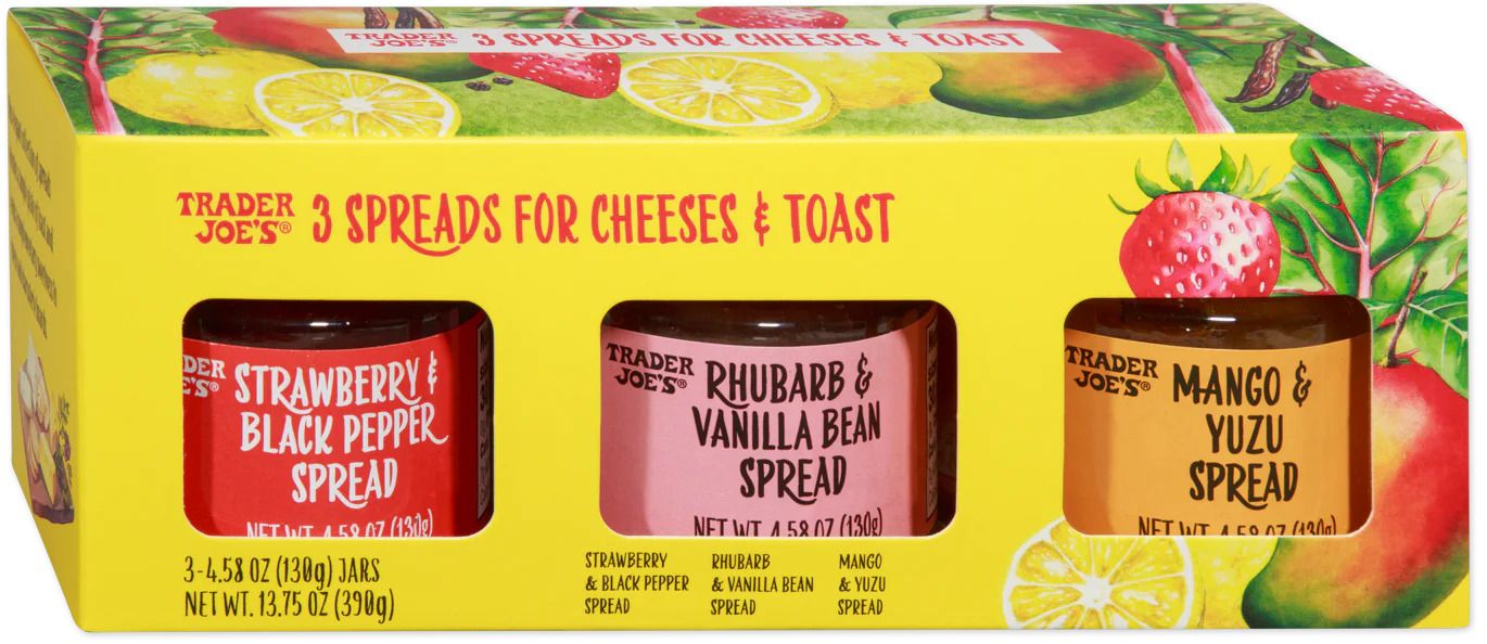 Box of three Trader Joes fruit spreads including Strawberry Black Pepper Rhubarb Vanilla Bean Mango Yuzu spreads