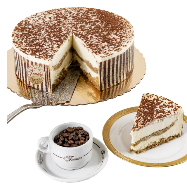 Slice of layered dessert with coffee beans in a cup tiramisu cake with a slice cut out