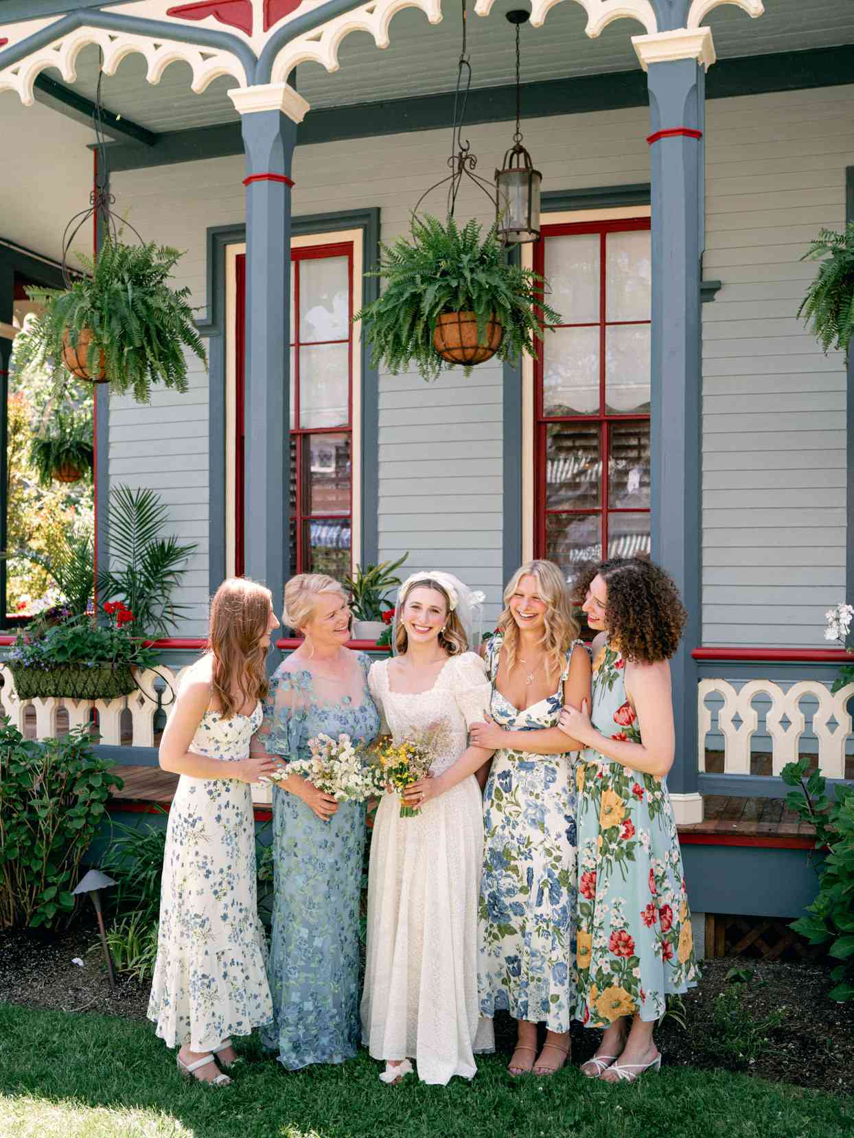 bridesmaids in floral patterned dresses