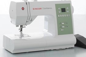 singer sewing machine on table