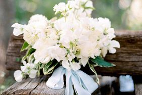 sweet pea bouquet with blue ribbon