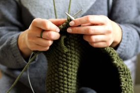woman hands knitting