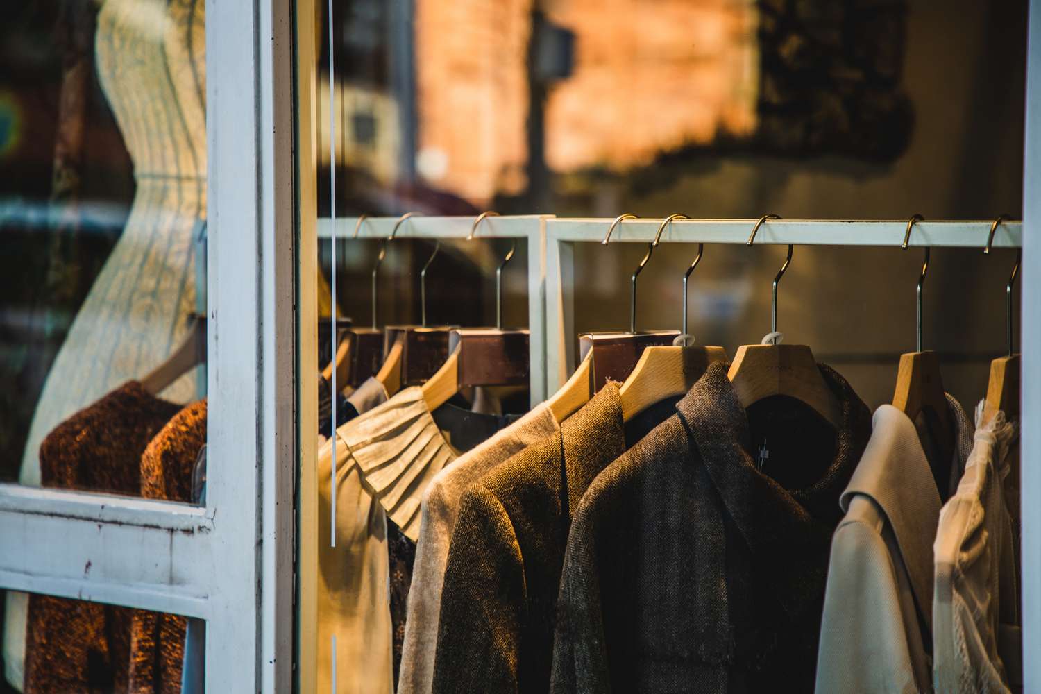 Clothing on hangers in a store window display