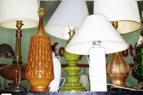 Various decorative table lamps displayed on a shelf