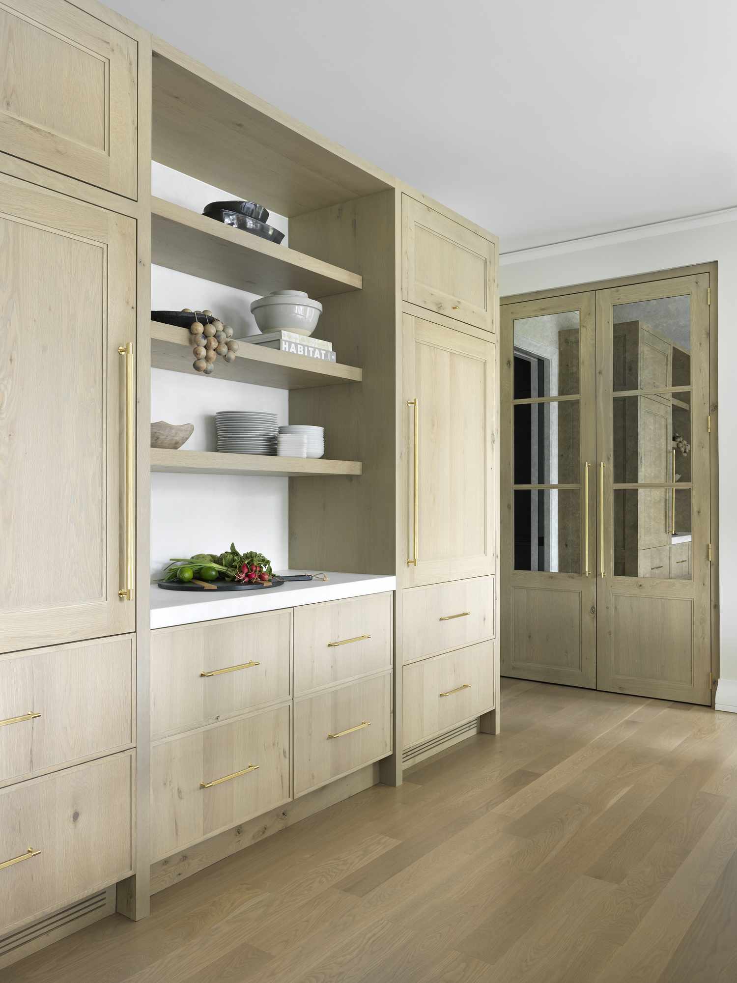 Kitchen with brown shelves and cabinets