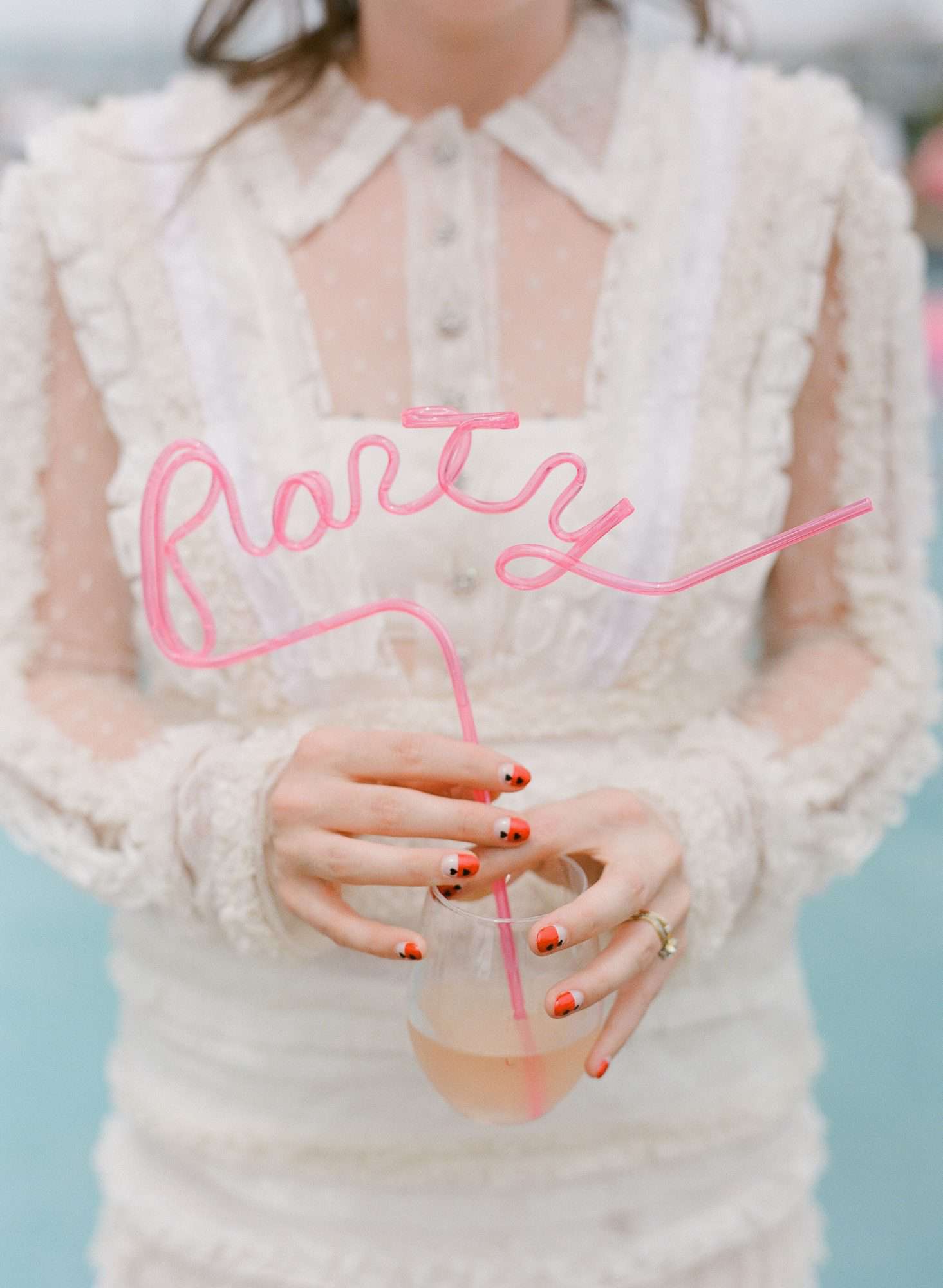 colleen stephen newport wedding drink with curly pink party straw