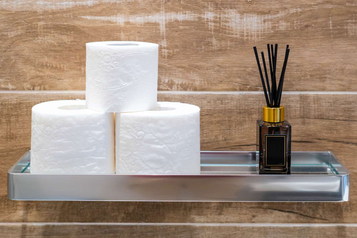 Shelf over door with toilet paper