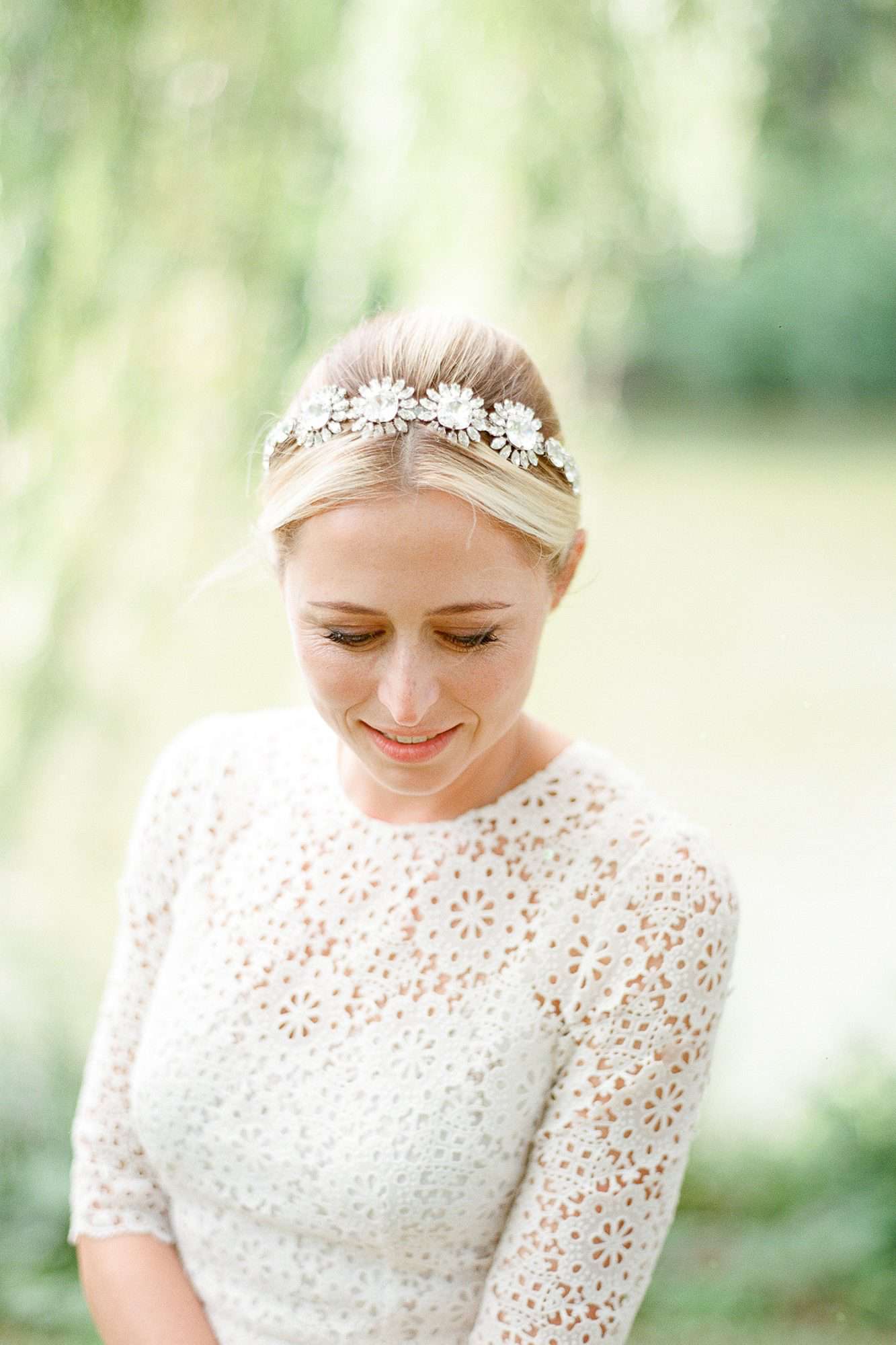 bride with high-neck dress and headband