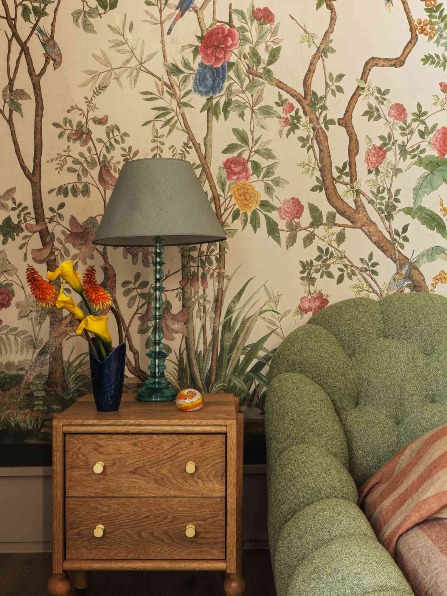 bedside lamp with floral wallpaper 