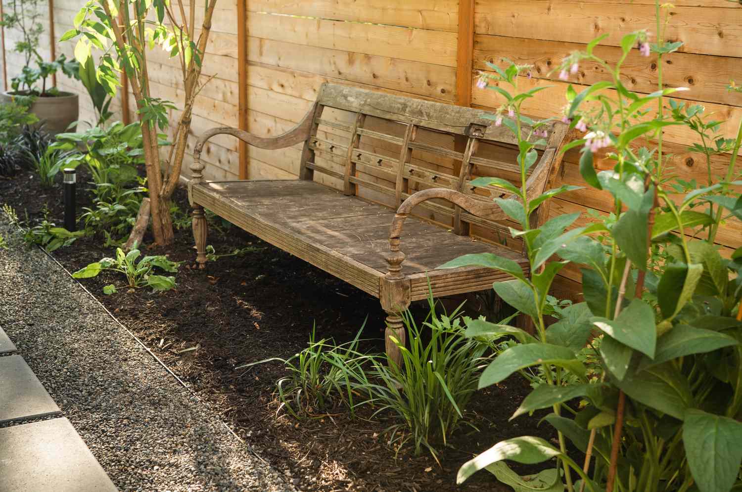 Wooden bench in garden