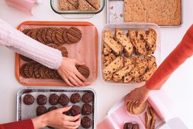 hands reaching for cookies