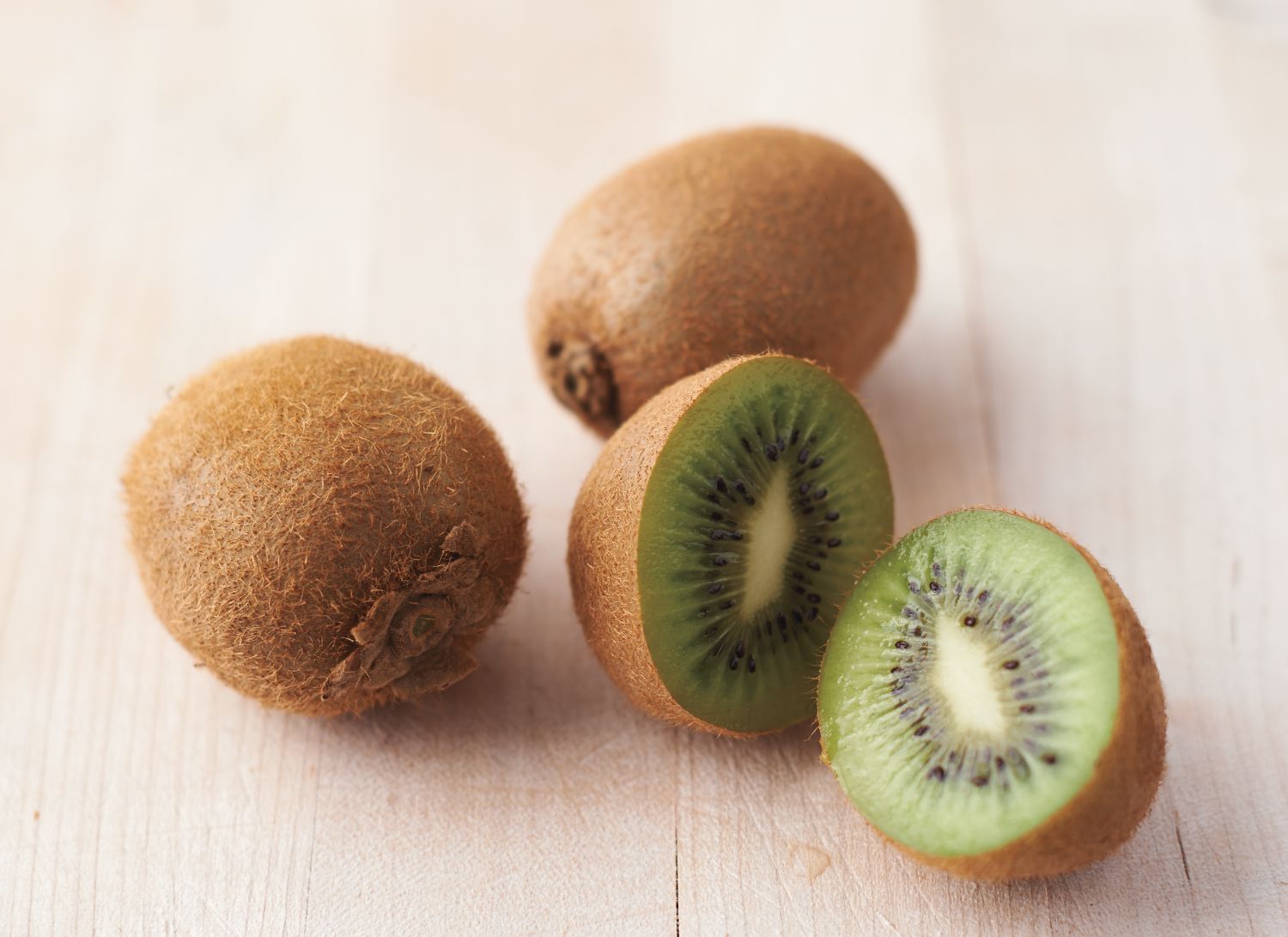 kiwi fruits on surface